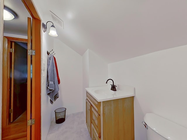 63 N Shore Dr, Owls Head, ME 04854 - bathroom featuring vanity and vaulted ceiling