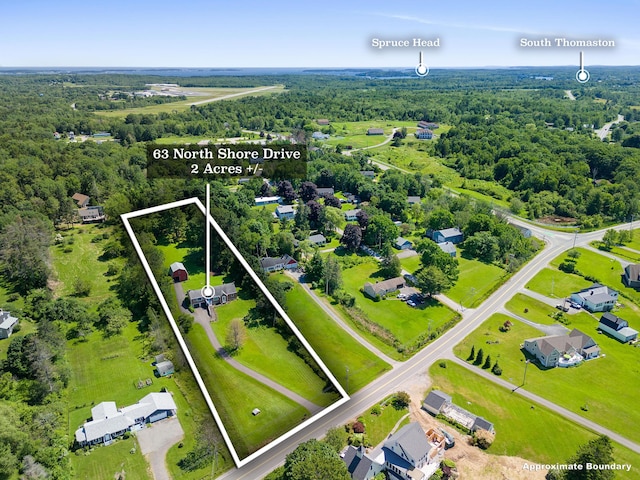 63 N Shore Dr, Owls Head, ME 04854 - aerial view of property's location with a forest and property boundaries highlighted