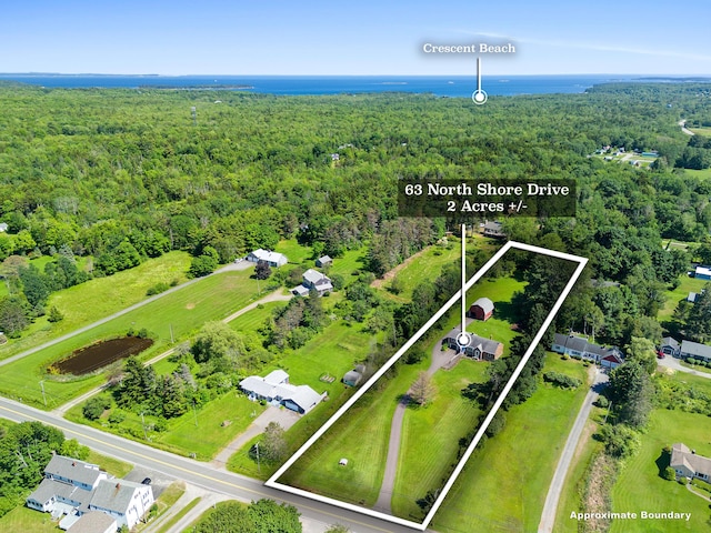 63 N Shore Dr, Owls Head, ME 04854 - view of property location featuring a heavily wooded area and property parcel outlined