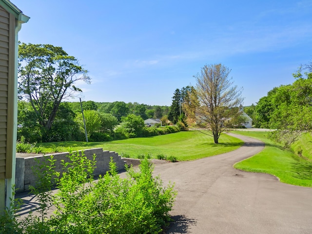 63 N Shore Dr, Owls Head, ME 04854 - view of home's community with a yard