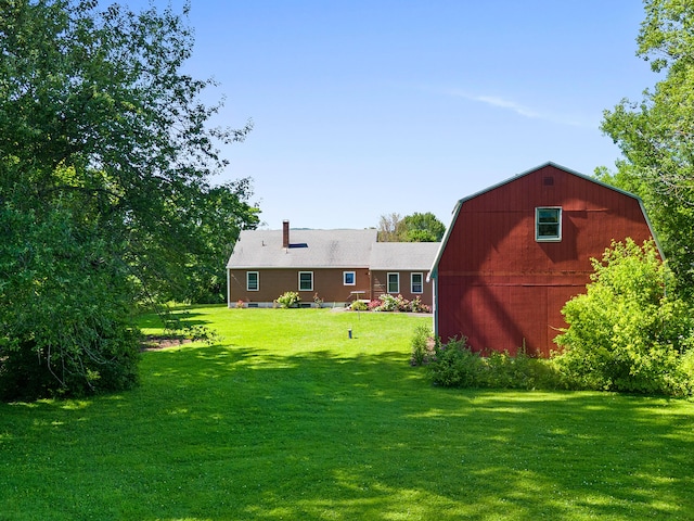 63 N Shore Dr, Owls Head, ME 04854 - view of green lawn with a barn and an outbuilding