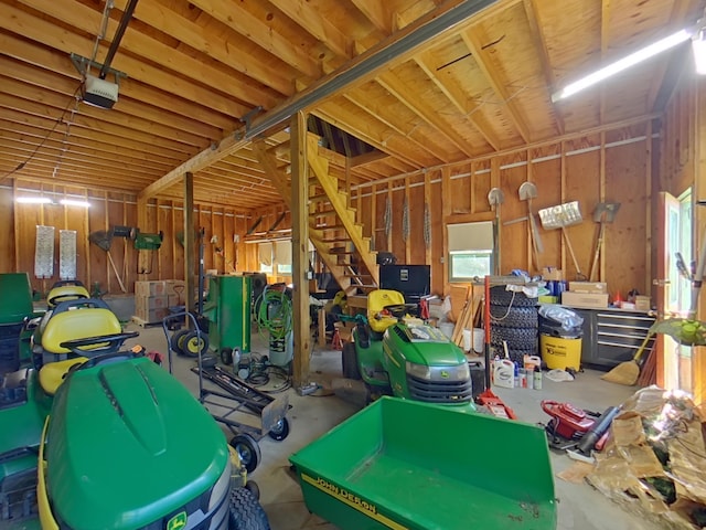63 N Shore Dr, Owls Head, ME 04854 - garage featuring a garage door opener