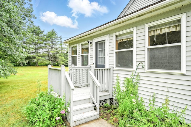 23 W St, Benton, ME 04901 - entrance to property featuring a lawn and a deck