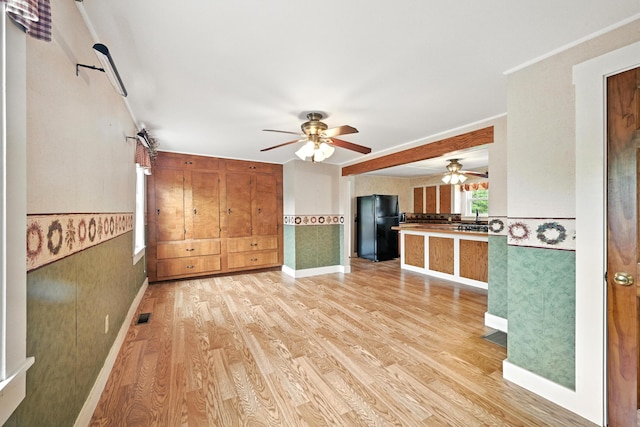 23 W St, Benton, ME 04901 - unfurnished living room featuring light wood-style floors and a ceiling fan