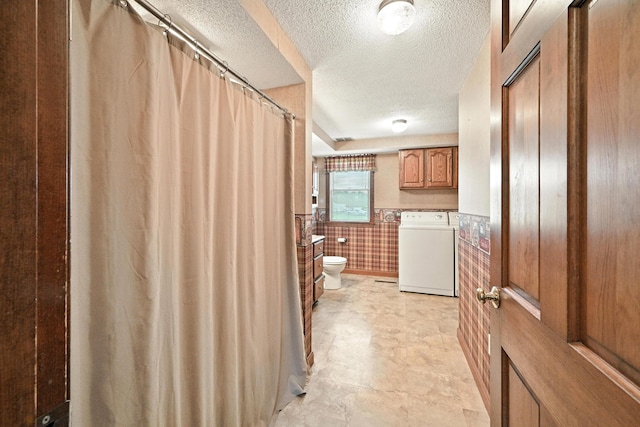 23 W St, Benton, ME 04901 - full bath with a textured ceiling, a wainscoted wall, independent washer and dryer, and a shower with curtain