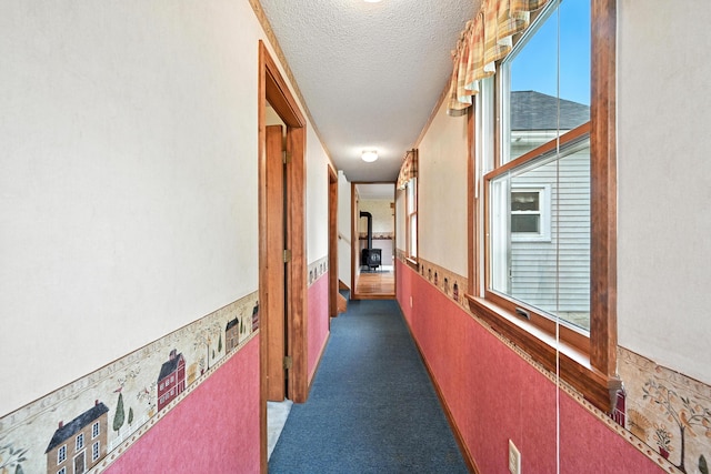 23 W St, Benton, ME 04901 - hallway featuring a textured ceiling and healthy amount of natural light
