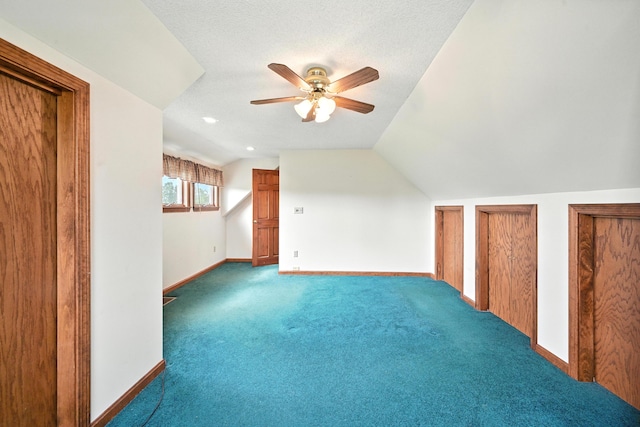 23 W St, Benton, ME 04901 - additional living space with a ceiling fan, vaulted ceiling, and carpet flooring