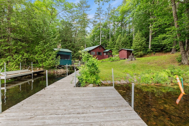 199 Peace Pipe Dr, Litchfield, ME 04350 - dock featuring a water view and a yard