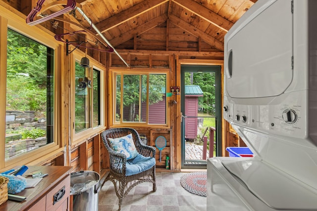 199 Peace Pipe Dr, Litchfield, ME 04350 - sunroom / solarium with stacked washer / dryer and vaulted ceiling