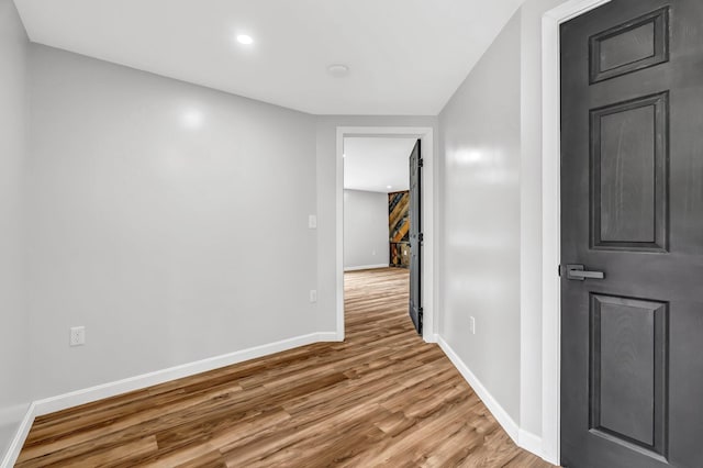 985 Main Rd, Eddington, ME 04428 - corridor with wood finished floors and recessed lighting