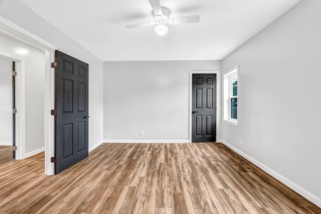 985 Main Rd, Eddington, ME 04428 - empty room featuring light wood-style flooring and ceiling fan