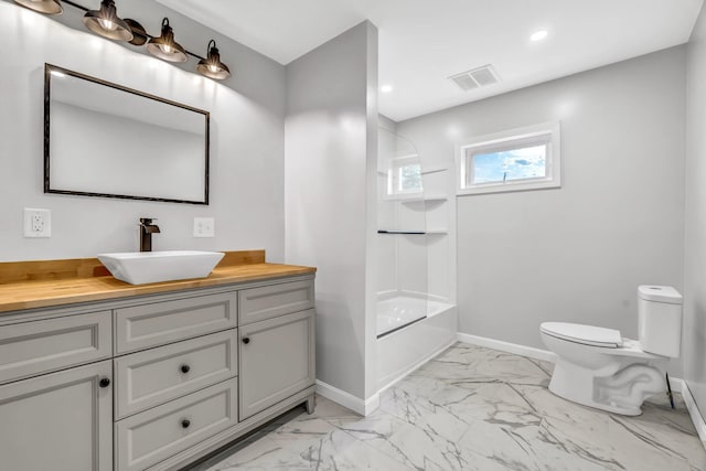 985 Main Rd, Eddington, ME 04428 - bathroom with marble finish floors, vanity, shower / bath combination, and recessed lighting