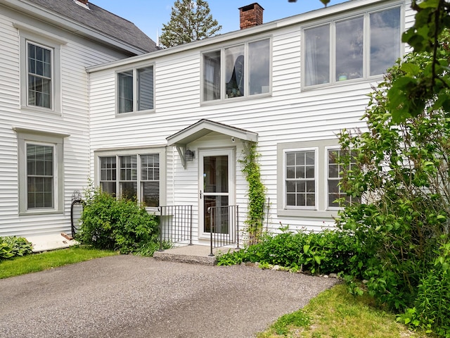 50-52 Mechanic St, Rockland, ME 04841 - view of front of property with a chimney and a patio