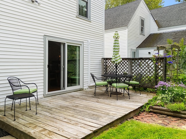 50-52 Mechanic St, Rockland, ME 04841 - wooden deck with outdoor dining space