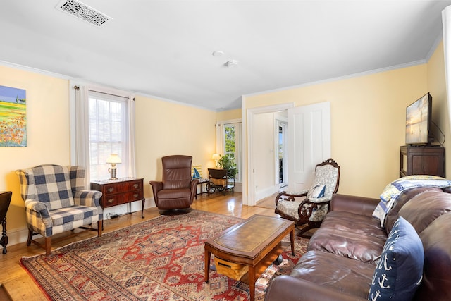50-52 Mechanic St, Rockland, ME 04841 - living room featuring light wood-style flooring and ornamental molding