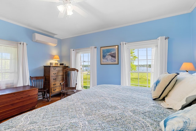 50-52 Mechanic St, Rockland, ME 04841 - bedroom featuring a wall unit AC, ornamental molding, wood finished floors, and ceiling fan