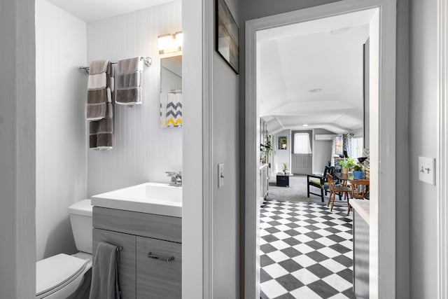 50-52 Mechanic St, Rockland, ME 04841 - bathroom with vanity, vaulted ceiling, and tile patterned floors