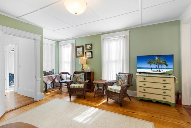 50-52 Mechanic St, Rockland, ME 04841 - living area with hardwood / wood-style flooring and crown molding