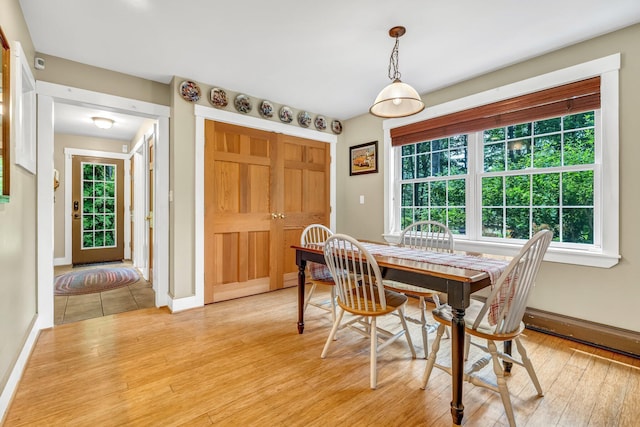 2 Falling Pines Ln, Readfield, ME 04355 - dining space with light wood-style flooring and a baseboard heating unit