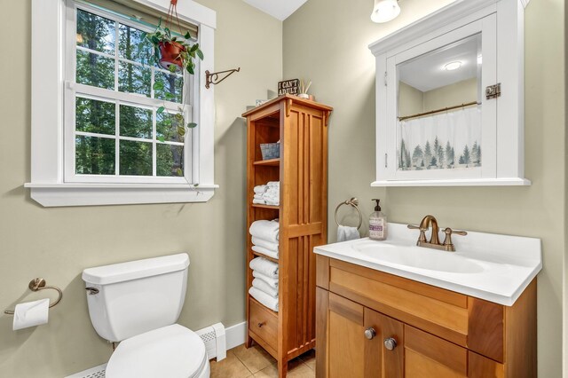 2 Falling Pines Ln, Readfield, ME 04355 - full bath featuring healthy amount of natural light, vanity, tile patterned floors, and a baseboard radiator