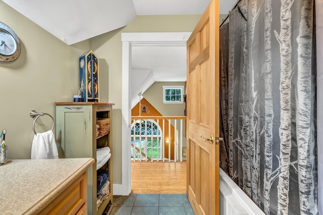 2 Falling Pines Ln, Readfield, ME 04355 - full bathroom featuring lofted ceiling, tile patterned flooring, and shower / tub combo with curtain