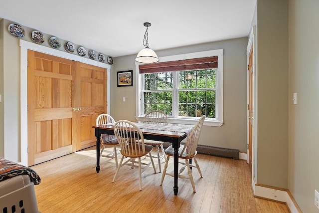 2 Falling Pines Ln, Readfield, ME 04355 - dining space with light wood finished floors and baseboard heating