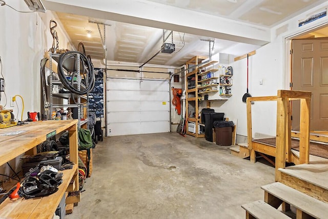 2 Falling Pines Ln, Readfield, ME 04355 - garage with a garage door opener and a workshop area