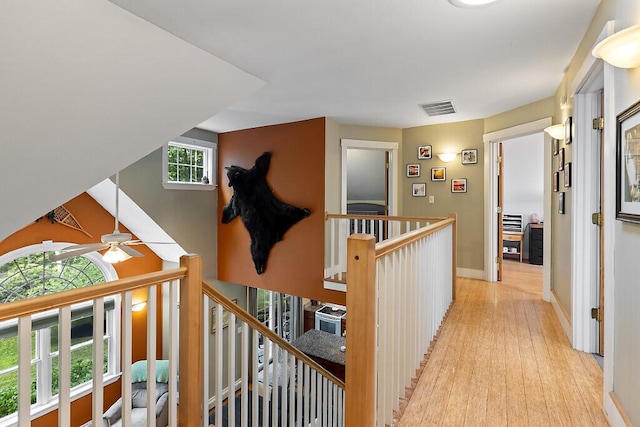 2 Falling Pines Ln, Readfield, ME 04355 - hall with light wood finished floors and an upstairs landing