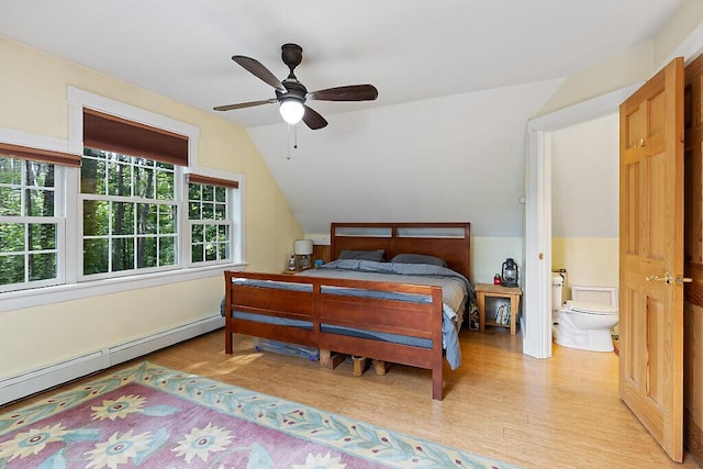 2 Falling Pines Ln, Readfield, ME 04355 - bedroom featuring light wood-type flooring, a baseboard heating unit, lofted ceiling, connected bathroom, and a ceiling fan
