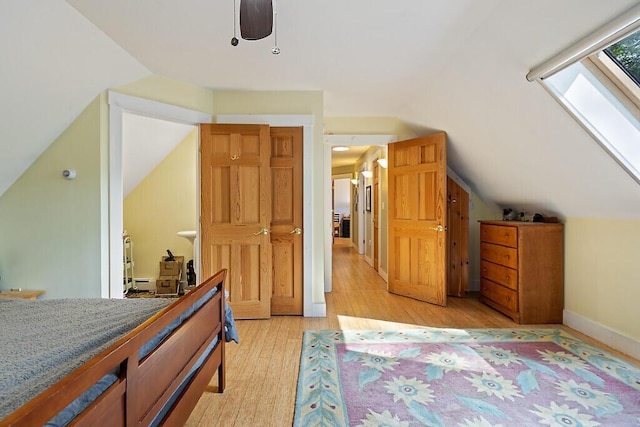 2 Falling Pines Ln, Readfield, ME 04355 - bedroom with lofted ceiling, light wood-type flooring, and a baseboard heating unit