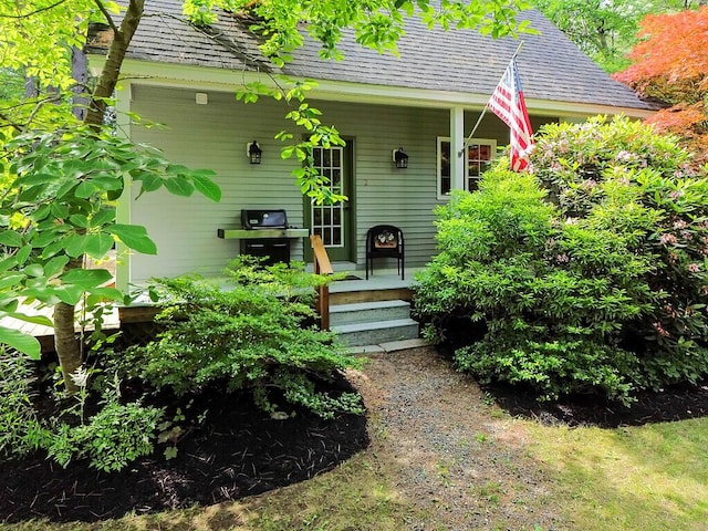 2 Falling Pines Ln, Readfield, ME 04355 - doorway to property featuring a porch