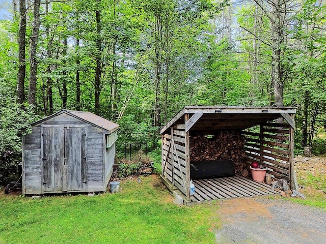 2 Falling Pines Ln, Readfield, ME 04355 - view of shed featuring a forest view