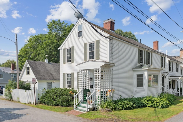 26 Grove St, Bath, ME 04530 - view of front of home featuring a chimney