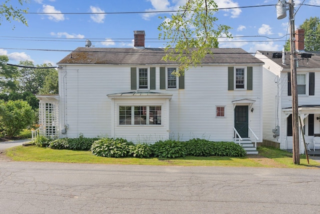 26 Grove St, Bath, ME 04530 - view of front facade featuring entry steps and a chimney