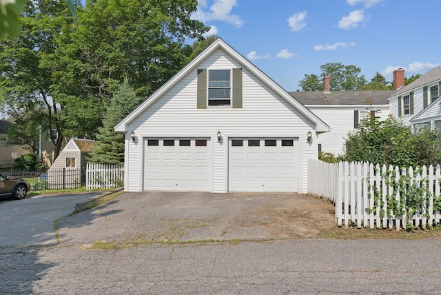 26 Grove St, Bath, ME 04530 - garage with asphalt driveway