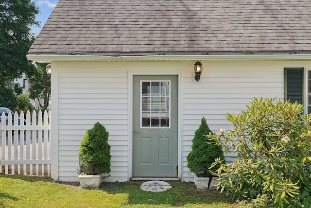 26 Grove St, Bath, ME 04530 - view of exterior entry featuring a shingled roof