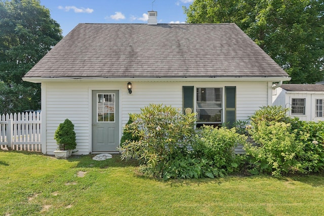 26 Grove St, Bath, ME 04530 - view of front of property featuring a chimney and a shingled roof