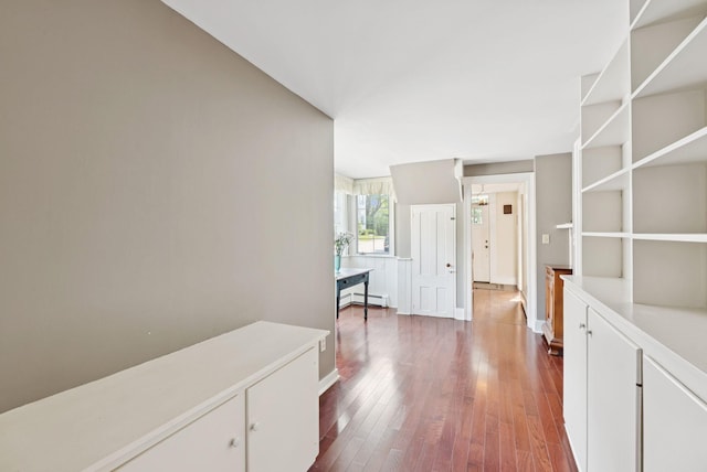 26 Grove St, Bath, ME 04530 - hall with dark wood finished floors and baseboard heating