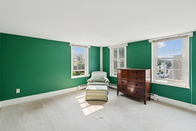 26 Grove St, Bath, ME 04530 - sitting room featuring carpet, a baseboard radiator, and plenty of natural light
