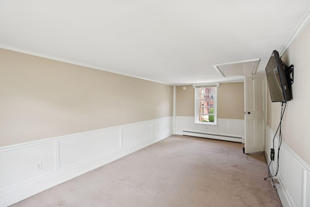 26 Grove St, Bath, ME 04530 - unfurnished room featuring a baseboard radiator, attic access, light carpet, a decorative wall, and wainscoting