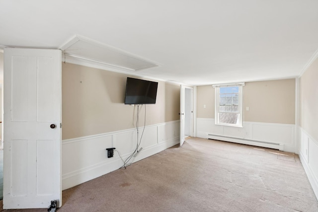 26 Grove St, Bath, ME 04530 - unfurnished bedroom with baseboard heating, attic access, carpet, wainscoting, and a decorative wall