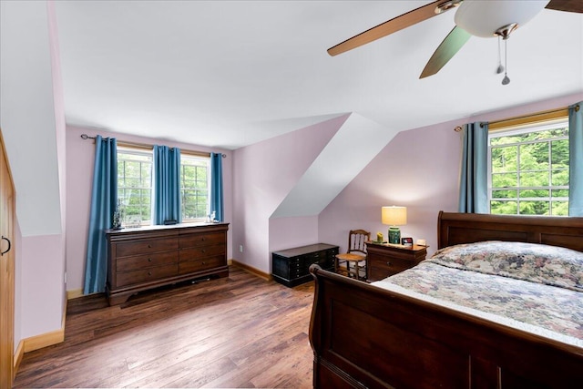134 Powers Drive Ln, Orland, ME 04472 - bedroom featuring wood finished floors, a ceiling fan, and lofted ceiling