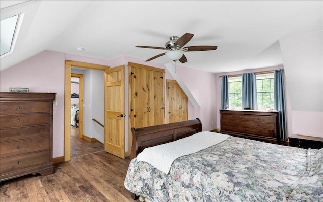 134 Powers Drive Ln, Orland, ME 04472 - bedroom featuring wood finished floors, ceiling fan, and vaulted ceiling