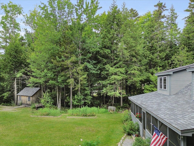 134 Powers Drive Ln, Orland, ME 04472 - view of green lawn featuring an outbuilding