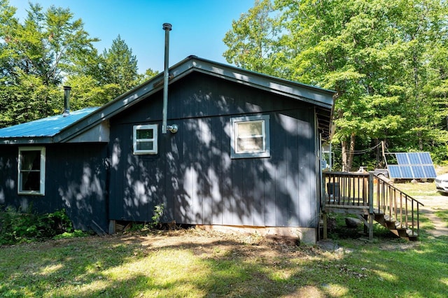 2198 Eight Rod Rd, Sidney, ME 04330 - view of home's exterior featuring a metal roof and a yard