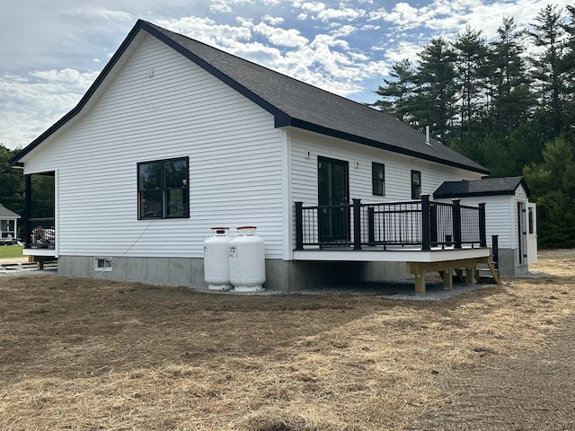 17 Emmas Way, Limerick, ME 04048 - rear view of house featuring a deck and a shingled roof