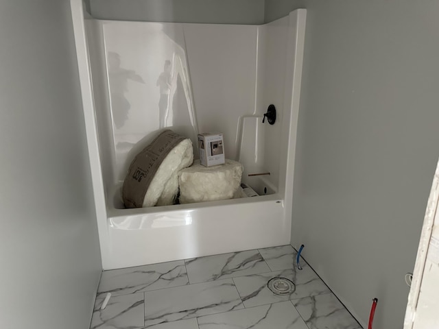 17 Emmas Way, Limerick, ME 04048 - bathroom with bathing tub / shower combination and marble look tile flooring