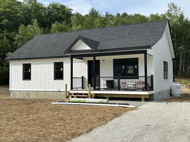 17 Emmas Way, Limerick, ME 04048 - modern farmhouse featuring covered porch and a shingled roof
