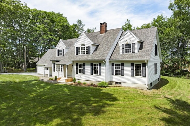 35 Rice Rd, Boothbay, ME 04544 - cape cod house featuring a chimney, roof with shingles, and a front lawn