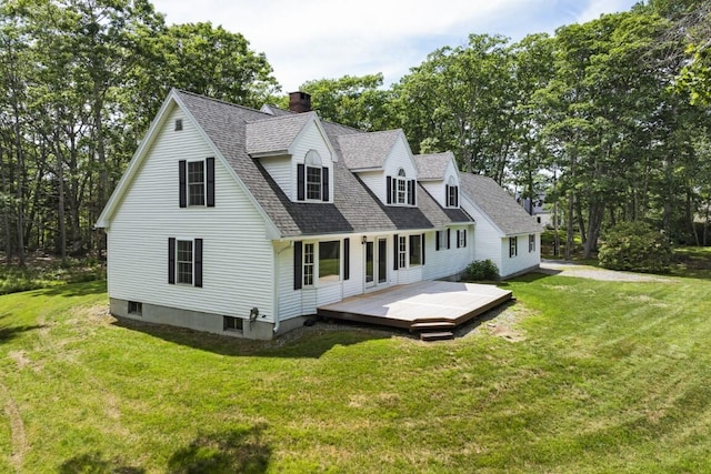 35 Rice Rd, Boothbay, ME 04544 - rear view of house featuring a wooden deck, a shingled roof, a chimney, a lawn, and view of scattered trees
